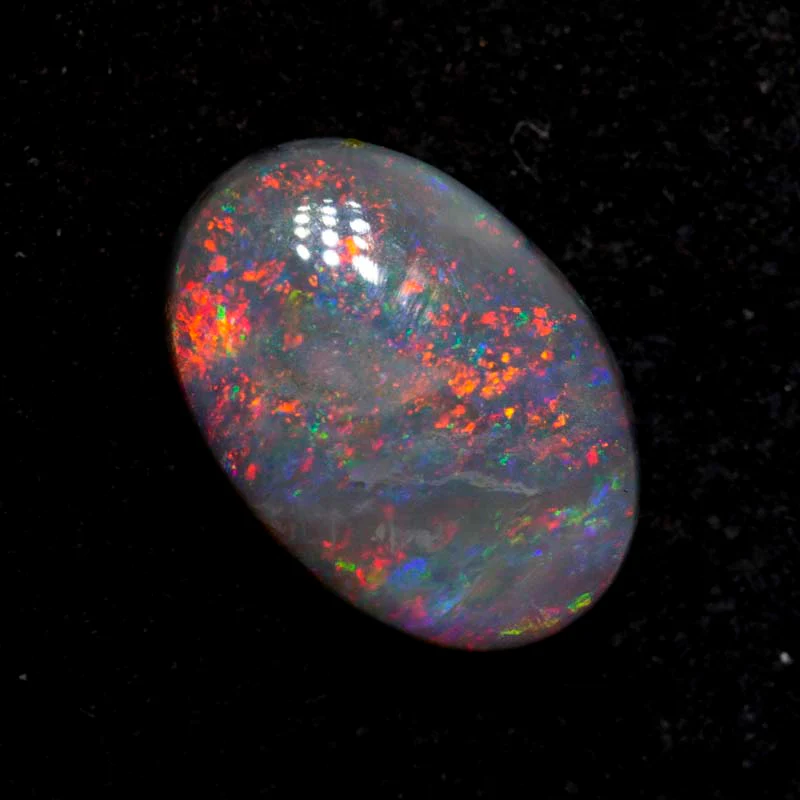 1.36 ct dark opal 9.6x6.7x3.2mm