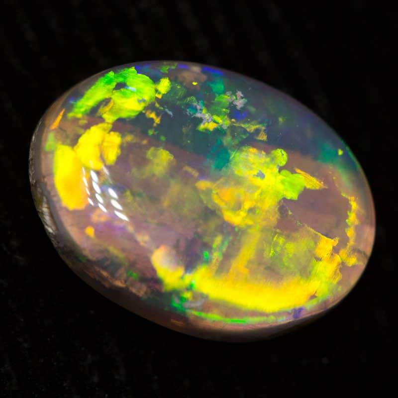 1.36 ct dark opal 9.6x7x3.2mm