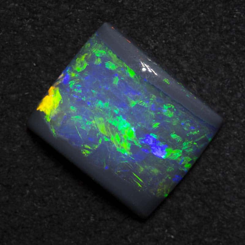 1.37 ct dark opal 8.3x7.1x2.9mm