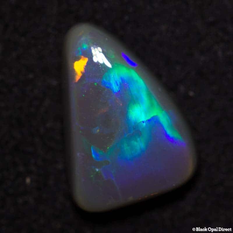 1.38 ct baroque semi black opal 10x7x3mm