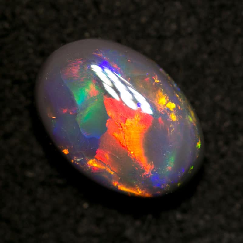 1.38 ct black opal gem 9x6.5x3.5mm