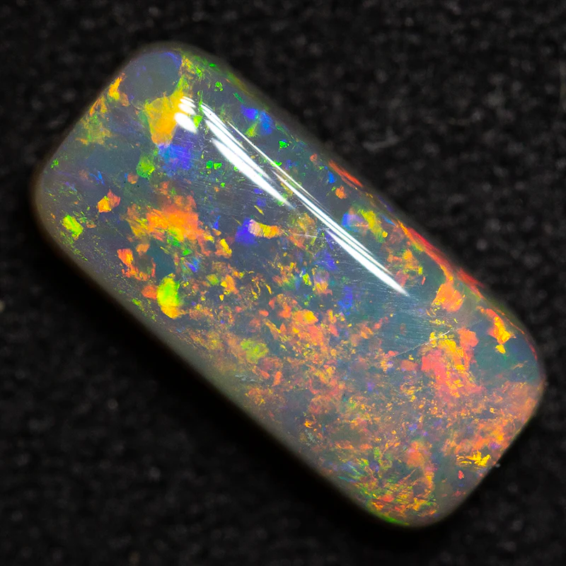 1.38 ct dark opal 10.3x4.9x3.2mm