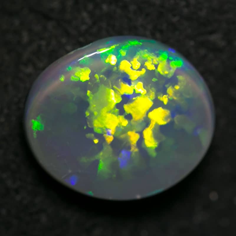 1.38 ct dark opal 9x8x3mm
