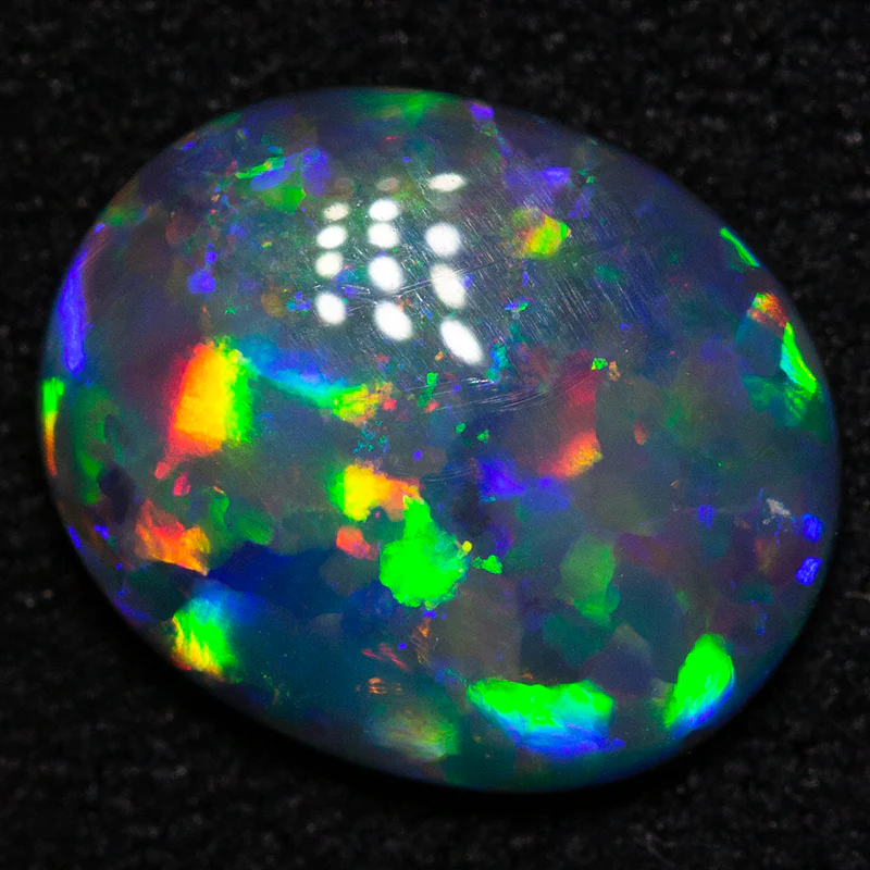 1.40 ct gem black opal 9.8x8.1x2.6mm