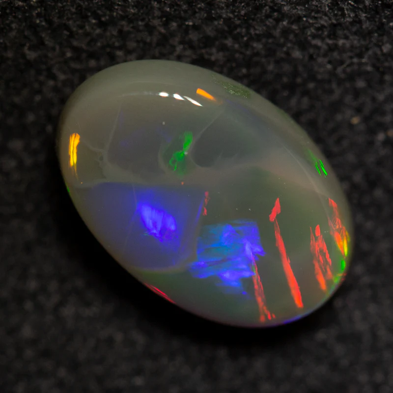 1.41 ct dark opal 9.4x6.3x3.5mm