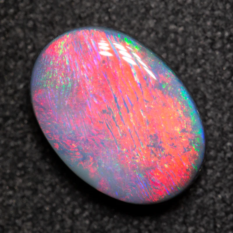 1.42 ct dark opal 9.4x6.7x3.4mm