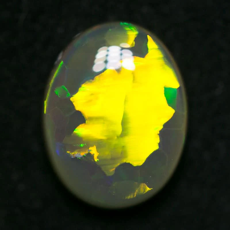 1.43 ct dark opal 9x7x3mm
