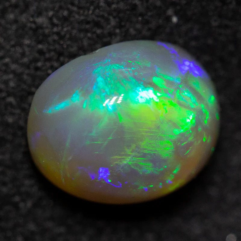1.44 ct dark crystal opal 7.9x6.6x4.3mm