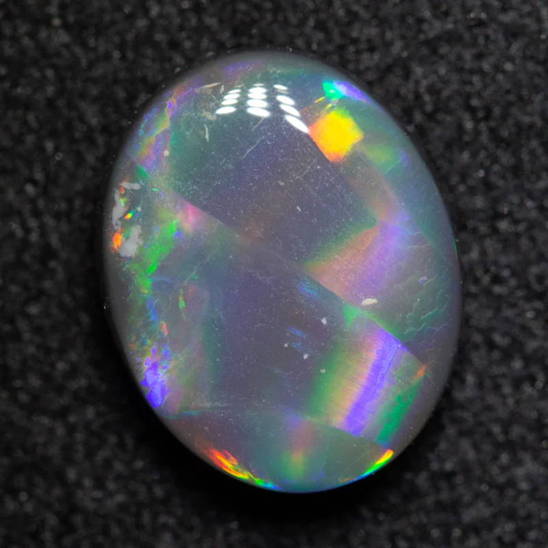 1.44 ct black opal 9x7x3 mm