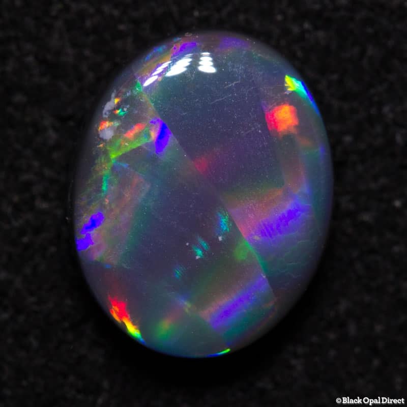 1.44 ct ribbon pattern black opal 9x7x3mm