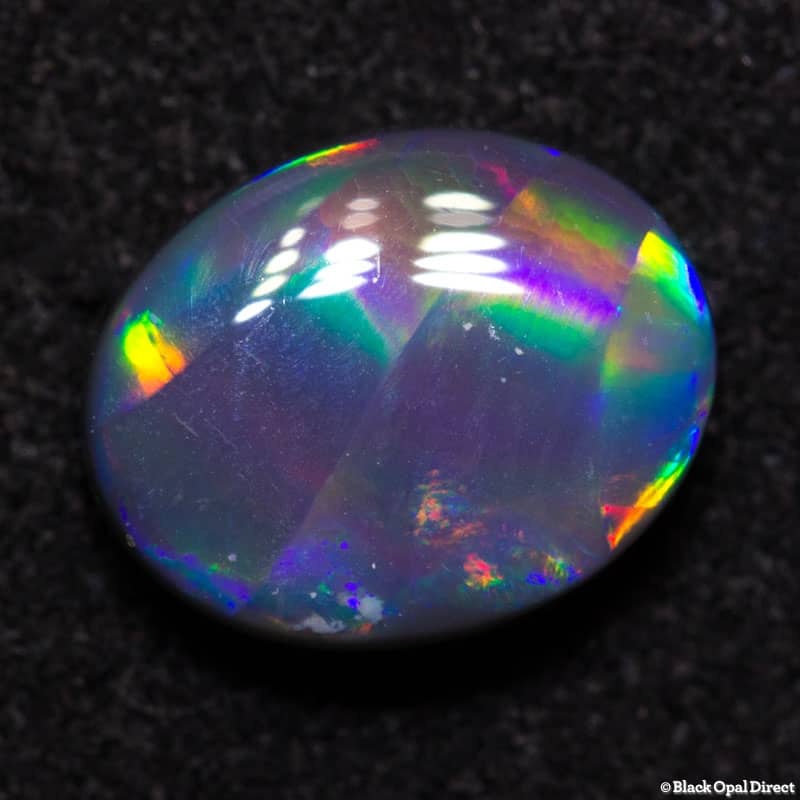 1.44 ct ribbon pattern black opal 9x7x3mm - Image 5