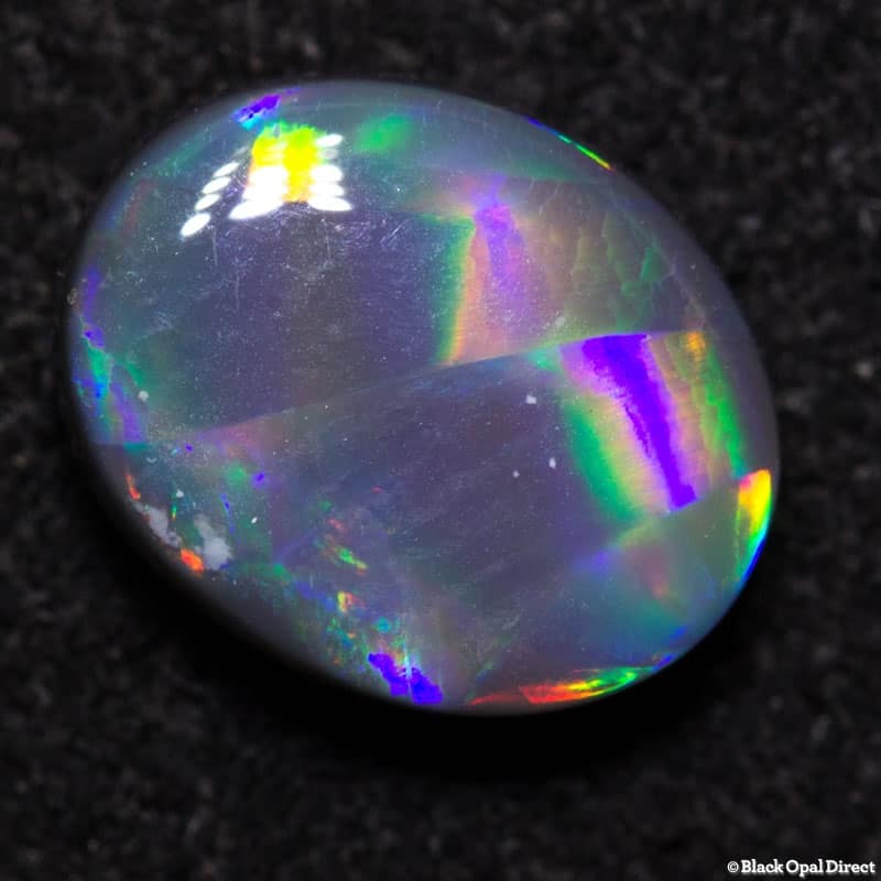 1.44 ct ribbon pattern black opal 9x7x3mm - Image 7
