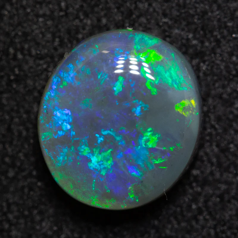1.45 ct dark crystal opal 7.8x7.1x3.7mm
