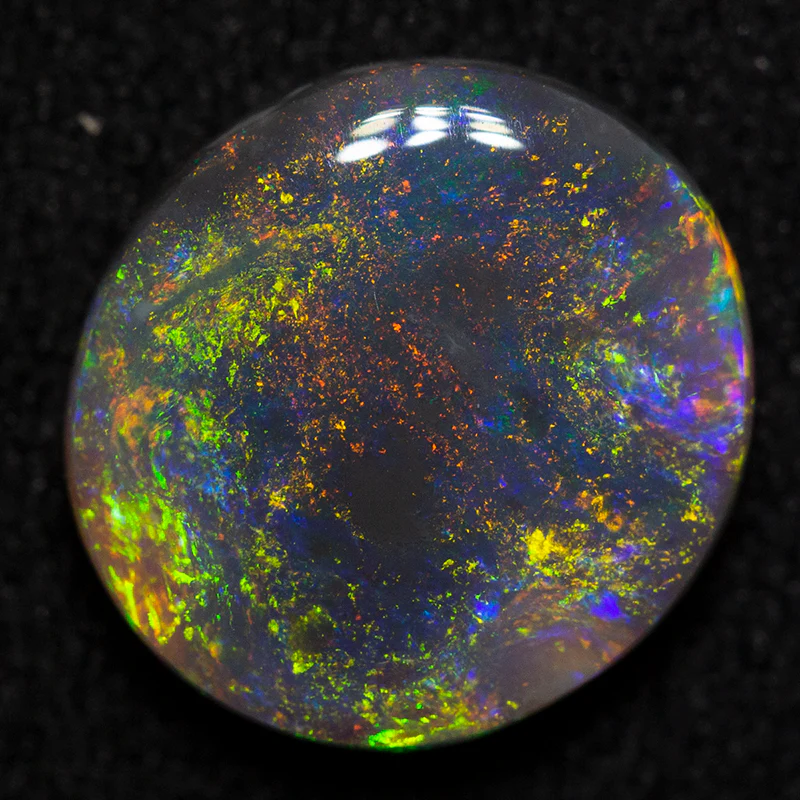 1.47 ct black opal 9.5x8.8x2.9mm