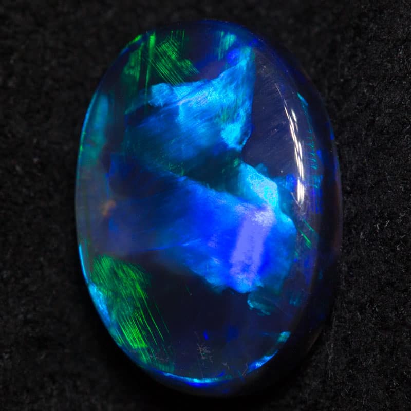 1.49 ct black opal 9.5x6.7x3.4mm