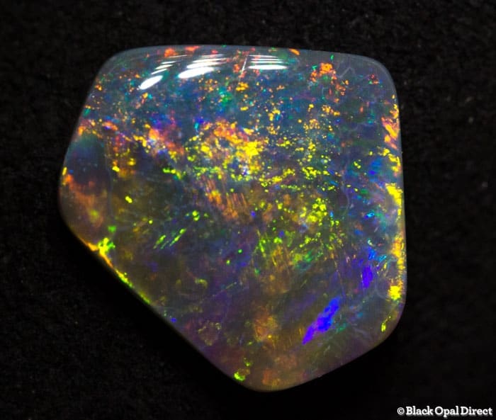 1.51 ct baroque black opal 10x9x2mm