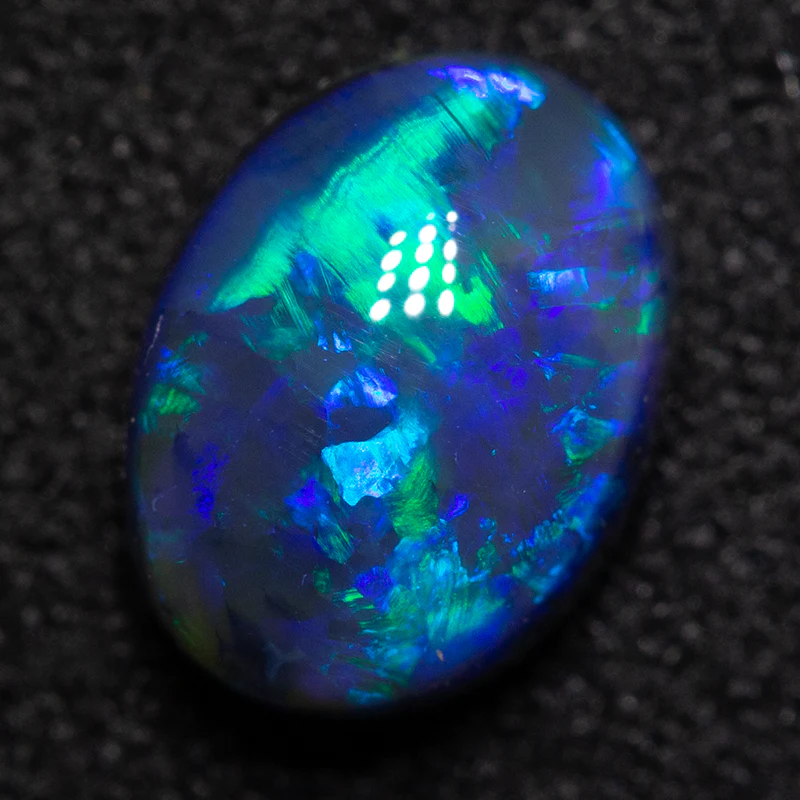 1.52 ct black opal 8.3x6.1x4.7mm