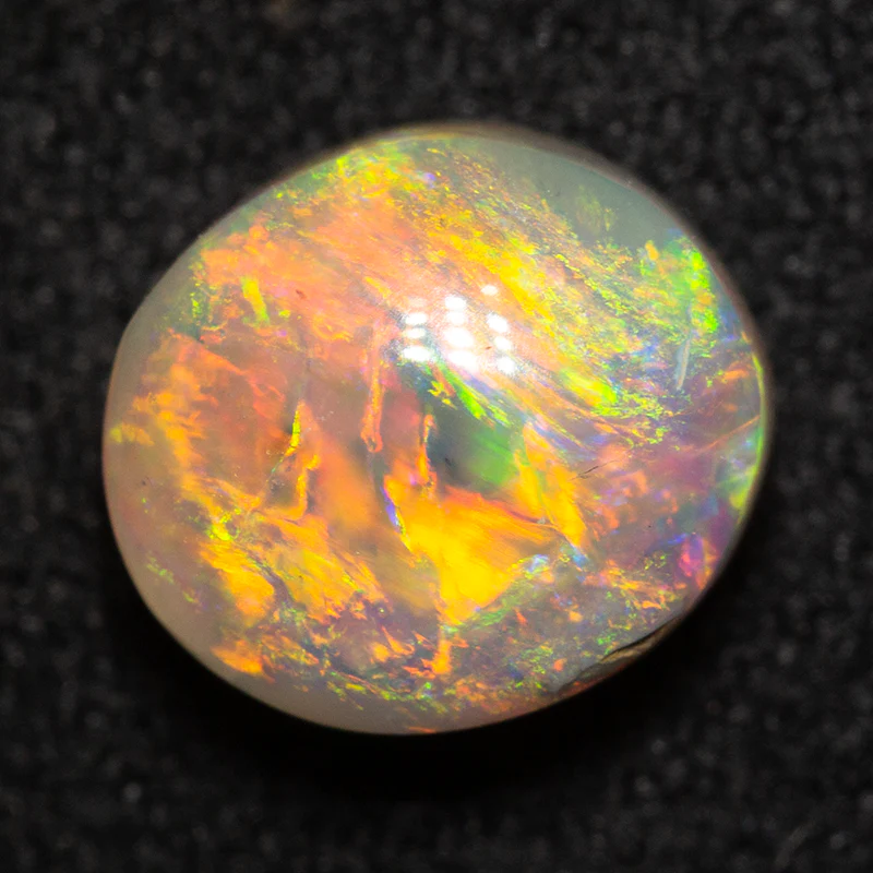 1.53 ct crystal opal 7.6x6.8x4.6mm