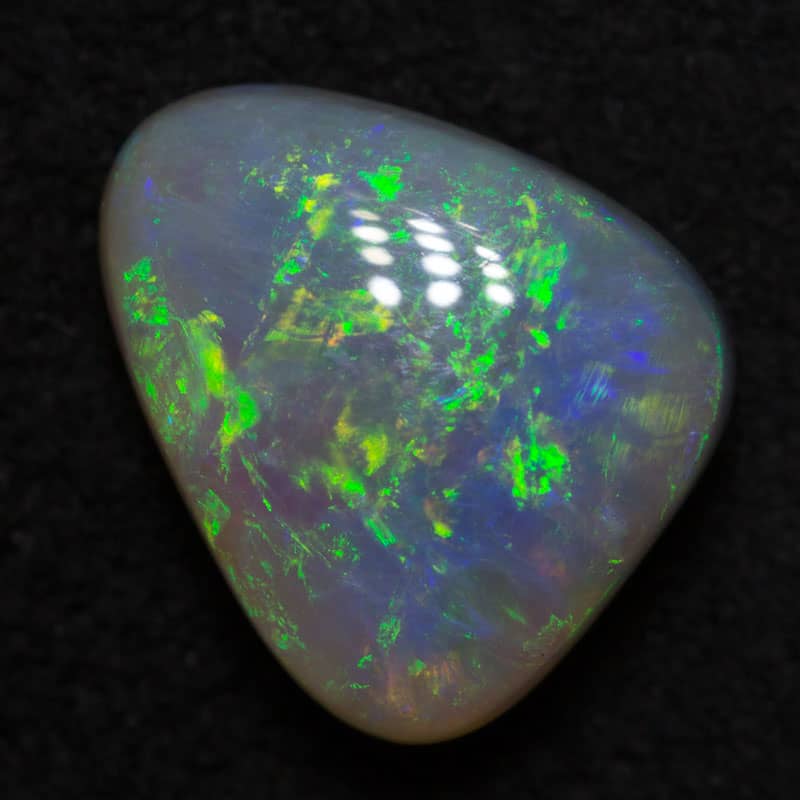 1.53 ct dark opal 9x7x4mm