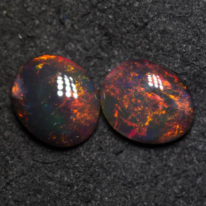 1.55 ct black opal pair 7.3x6.1x2.7mm
