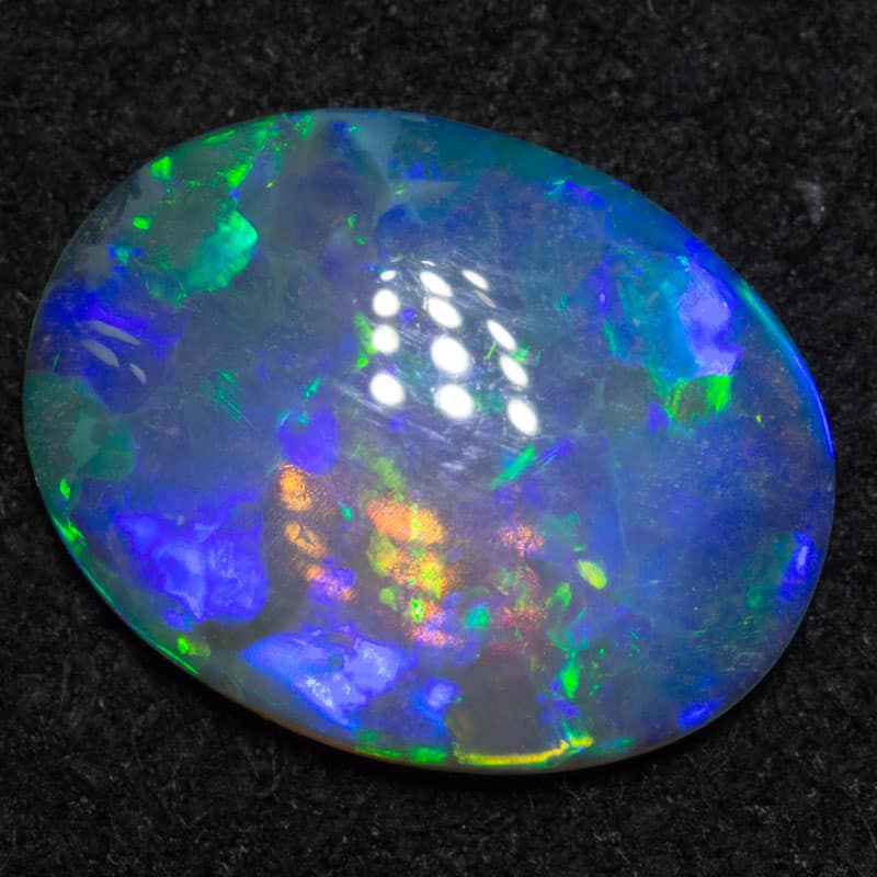 1.55 ct crystal opal 11.1x8.5x2.6mm