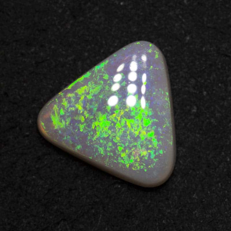 1.55 ct dark opal 9.8x9.1x2.8mm
