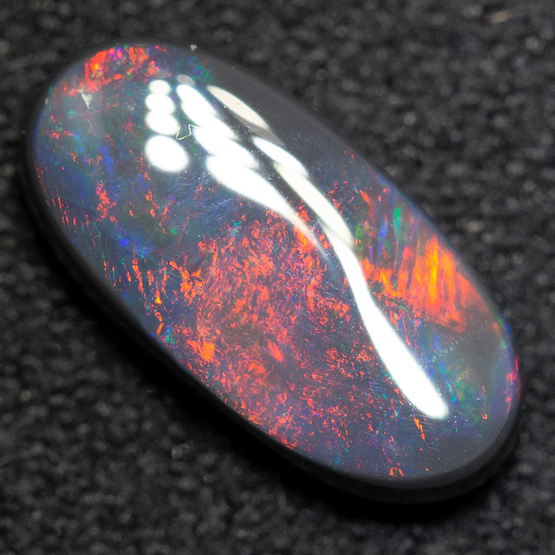 1.56 ct black opal 11.7x5.8x2.9mm
