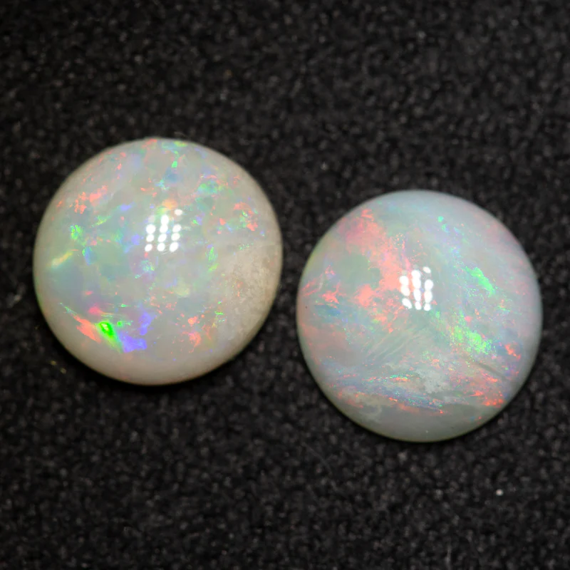 1.58 ct white opal pair 7x6.9x2.5mm