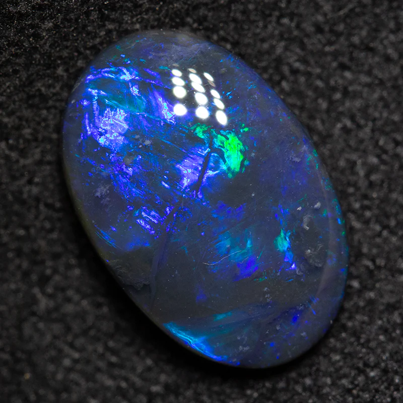 1.59 ct black opal 10.7x7.1x3.3mm