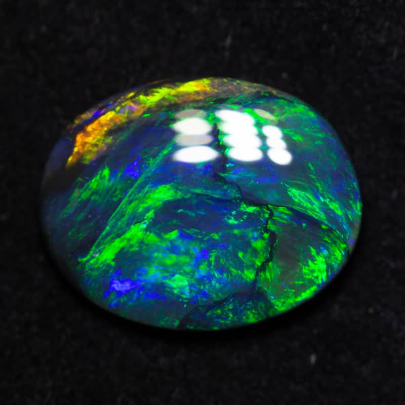 1.60 ct black opal 11x8x2.5mm