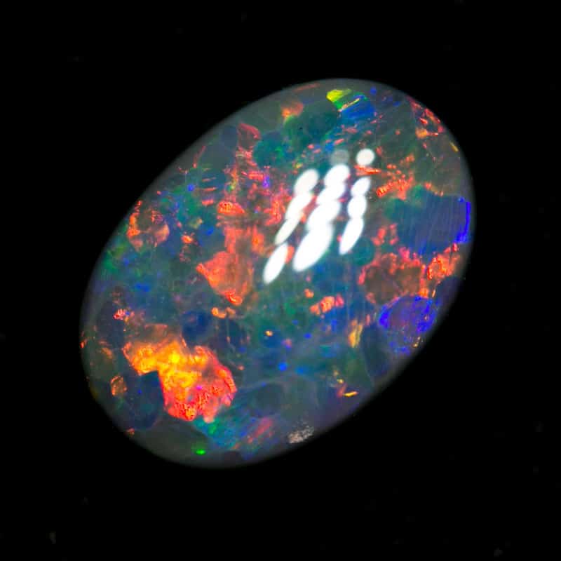 1.60 ct dark opal 9x7x3.5mm