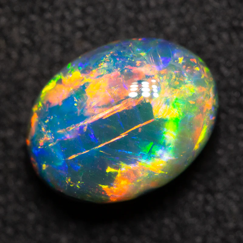 1.62 ct gem black opal 8.4x6.5x4.9mm