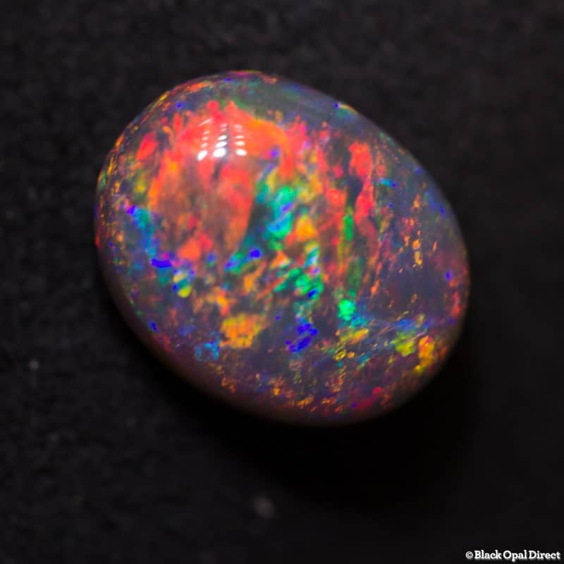 1.62 ct gem black opal 9x7.2x4mm