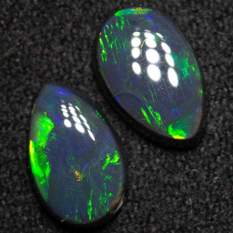 1.66 ct black opal pair 8.2x5.2x2.8mm