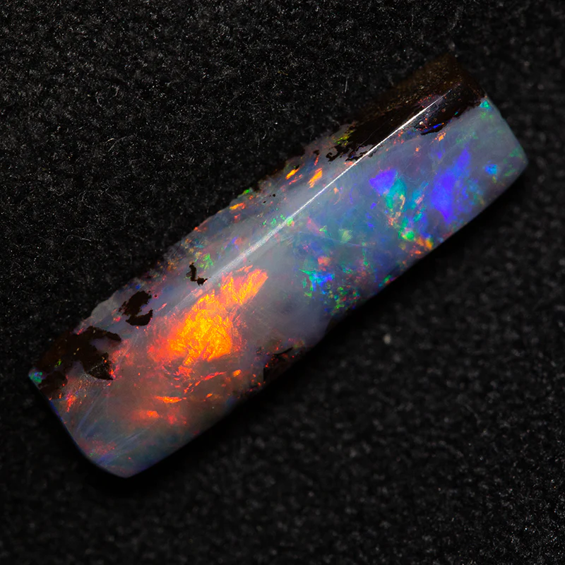 1.68 ct boulder opal 14.2x3.9x2.5mm