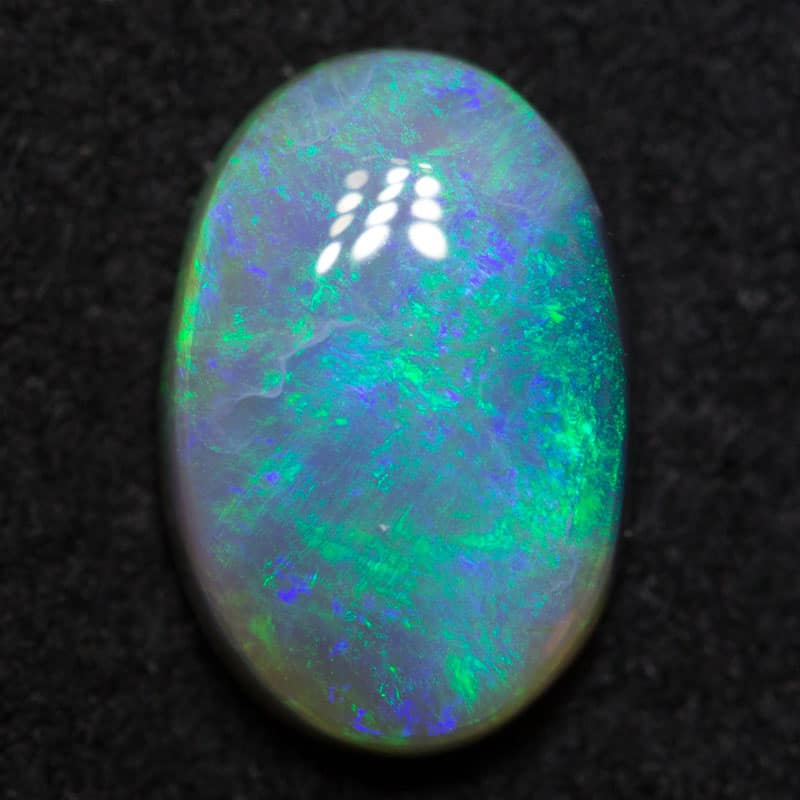 1.68 ct dark opal 10.1x6.8x3.5mm
