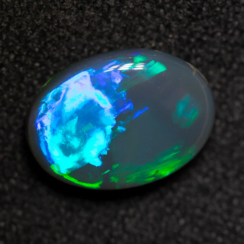 1.70 ct black opal 10.2x7.4x3.5mm
