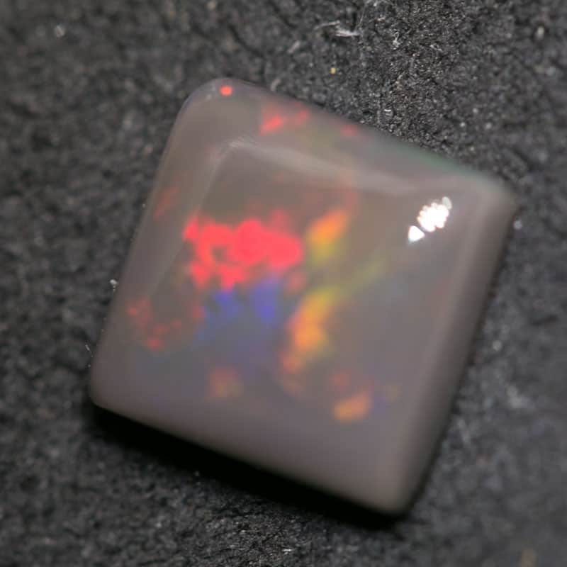 1.72 ct black opal cushion 7x7x3mm