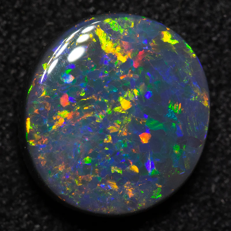 1.74 ct black opal 8.8x8.1x3.7mm