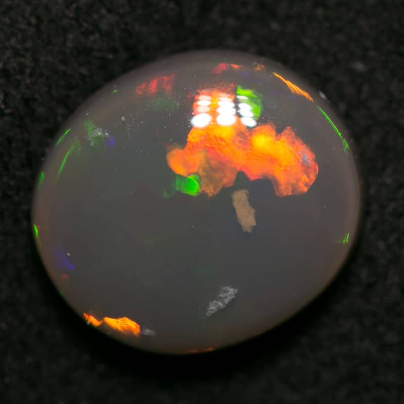 1.74 ct black opal 9x8x4mm