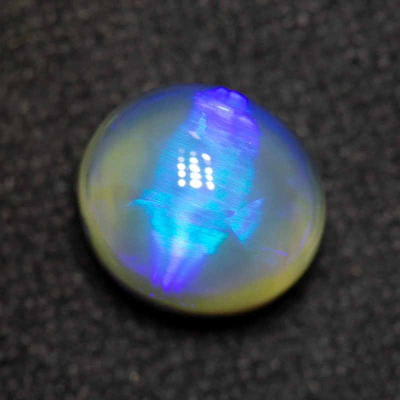 1.74 ct dark opal 7.7x6.8x5.6mm