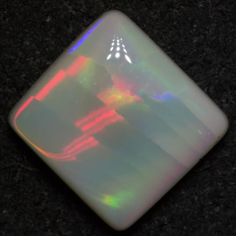 1.74 ct dark opal 8.2x7.7x3.1mm