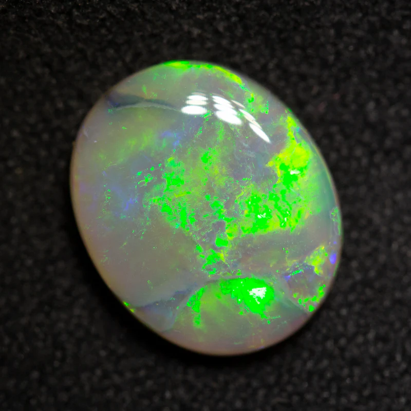 1.74 ct dark opal 9.9x8.1x2.9mm