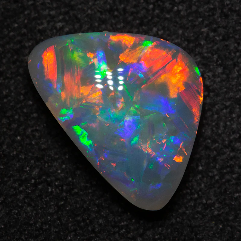 1.75 ct dark opal 11x7.5x3.8mm
