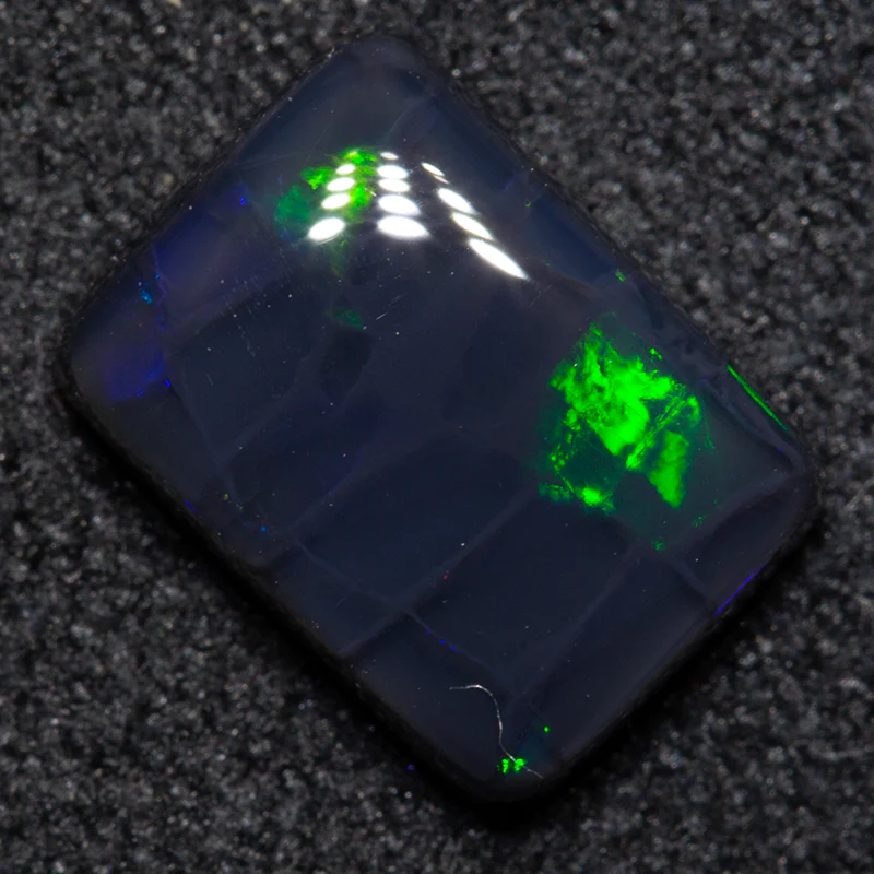 1.80 ct black opal 9x6.5x3mm