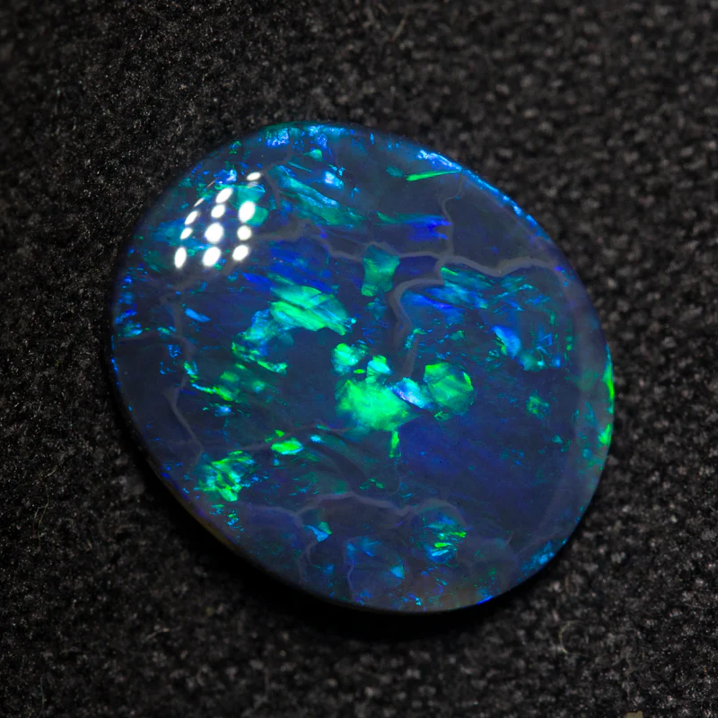1.82 ct black opal 11.4x9.5x2.4mm