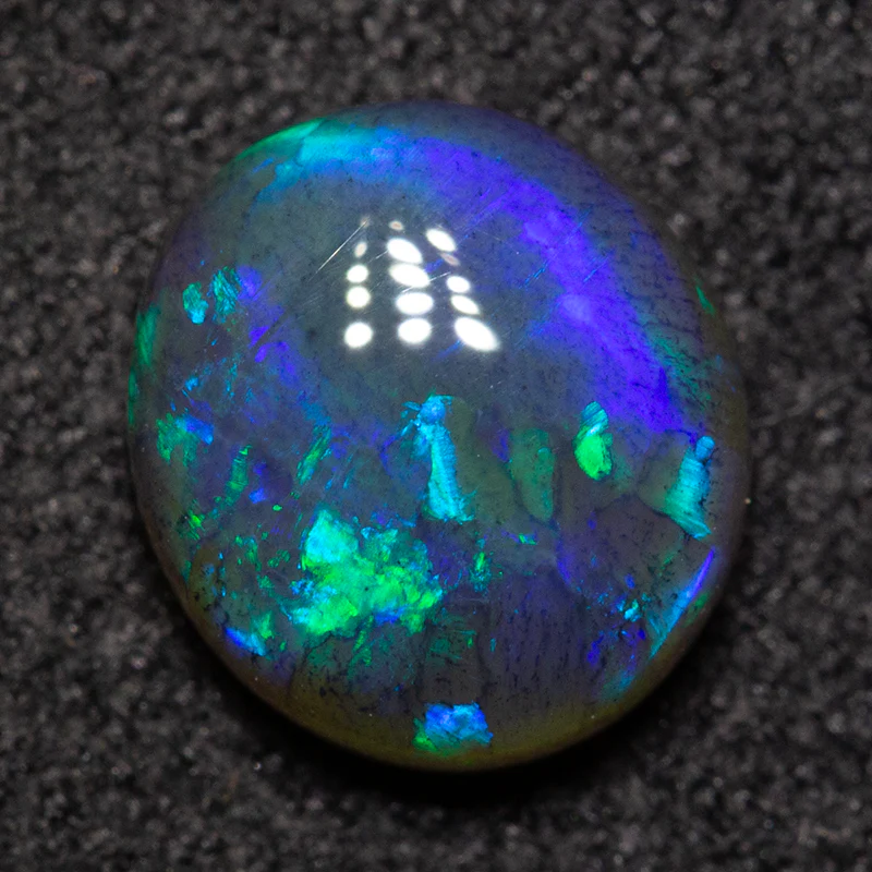 1.60 ct black opal 8.4x7.6x3.9mm