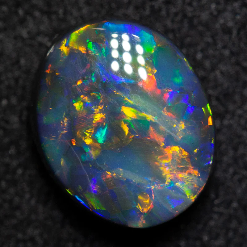 1.82 ct black opal 9x7.5x4 mm