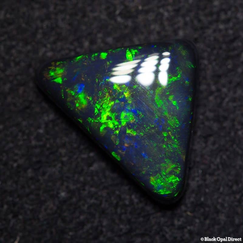1.82 ct black opal triangle 10x9x3mm