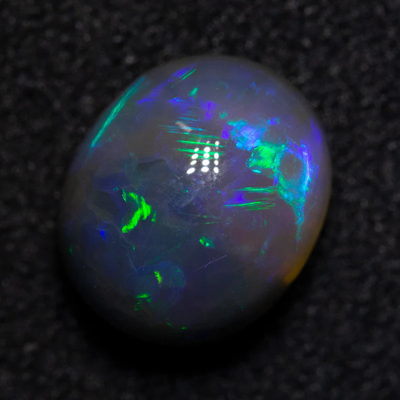 1.85 ct black opal 8.1x6.8x5.4mm